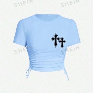 Baby Blue Shirt With Strings And Black Cross Graphics